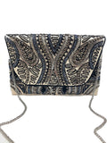 HEMATITE STUDDED BEADED CLUTCH