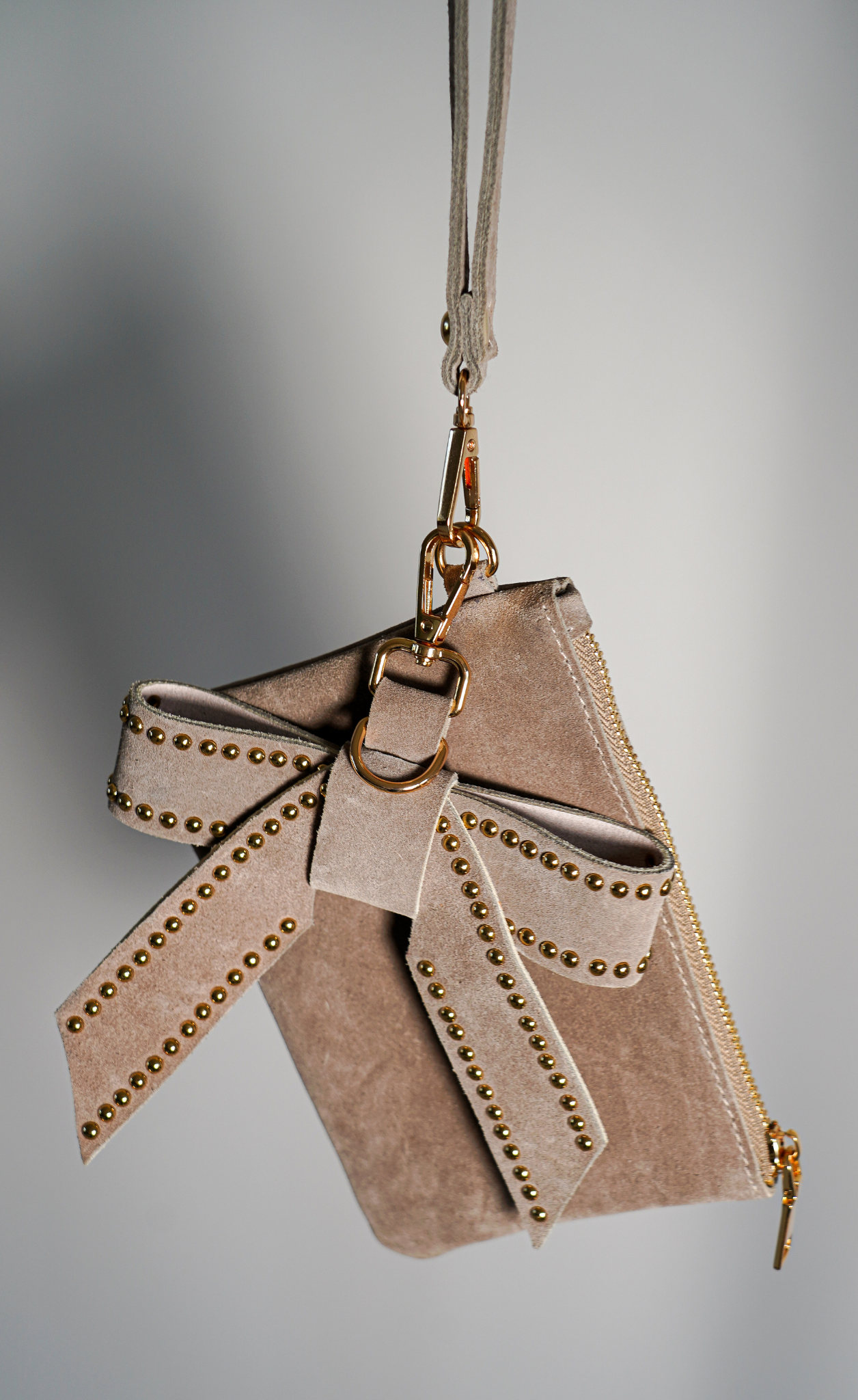 Suede Wristlet with Removable Bow Charm